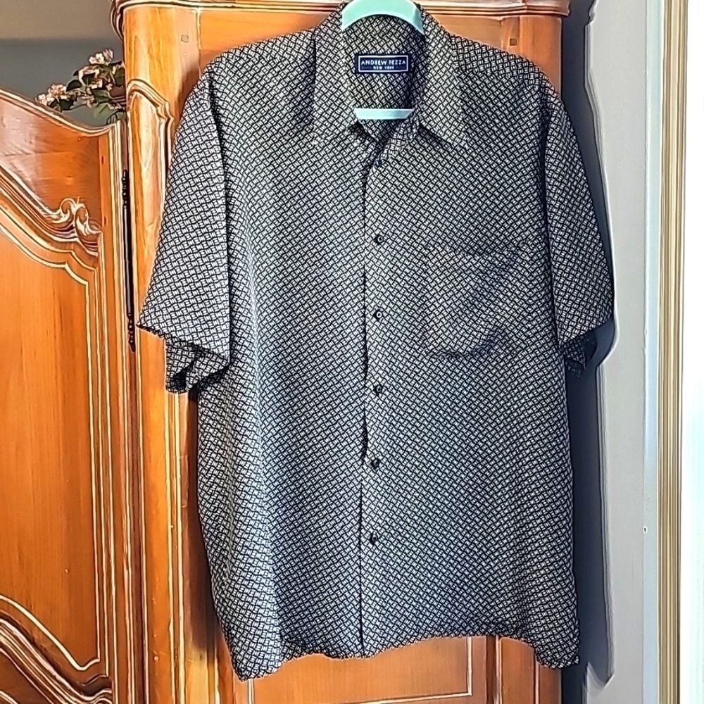 H8 ANDREW FEZZA NEW YORK, 100% blue sik shirt.‎ Short sleeves button-down. L…